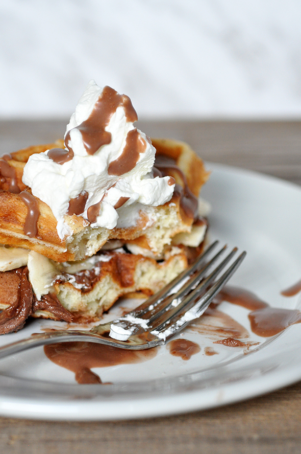 Recipe for easy and delicious Peanut Butter, Chocolate, and Banana Belgian Waffle Sandwiches via http://lifeovereasy.com/ - perfect for breakfast or brunch!
